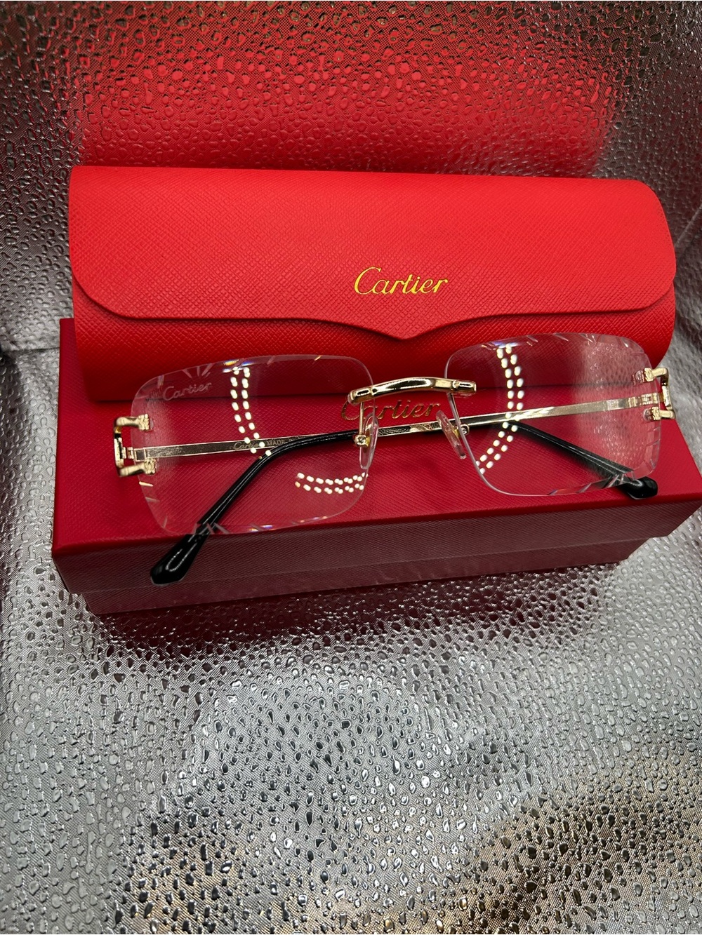 Rimless Gold and Black Eyeglasses with Red Case